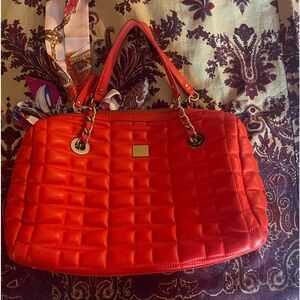 Kate Spade - Perfect pop of color orange leather bag. No noted.flaws.